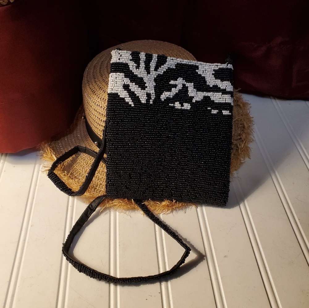 Mini black and white bead bag.